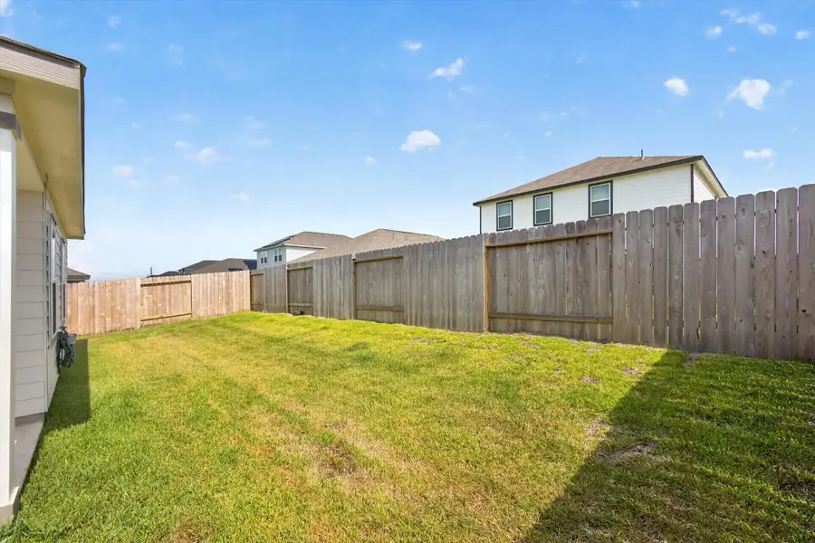 Exterior details and patio area of a home in , Waller (Image 3).
