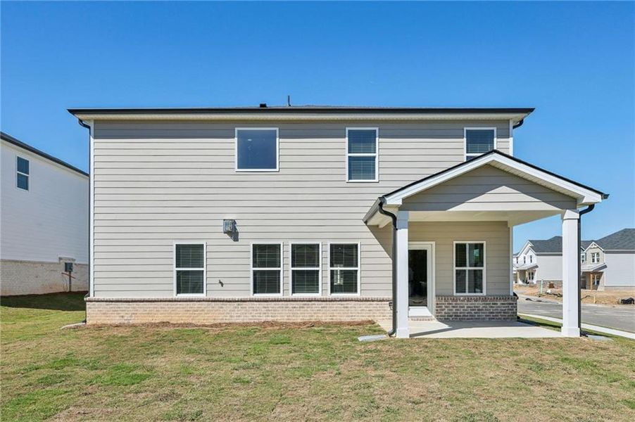 Exterior details and patio area of a home in Parkside at Grayson, Grayson (Image 3).