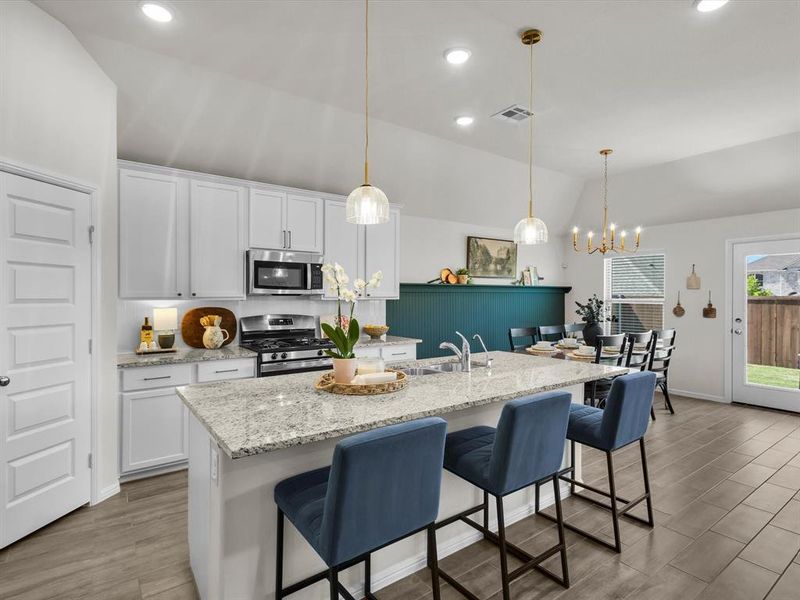 This expansive island is perfect for meal prep or casual dining.