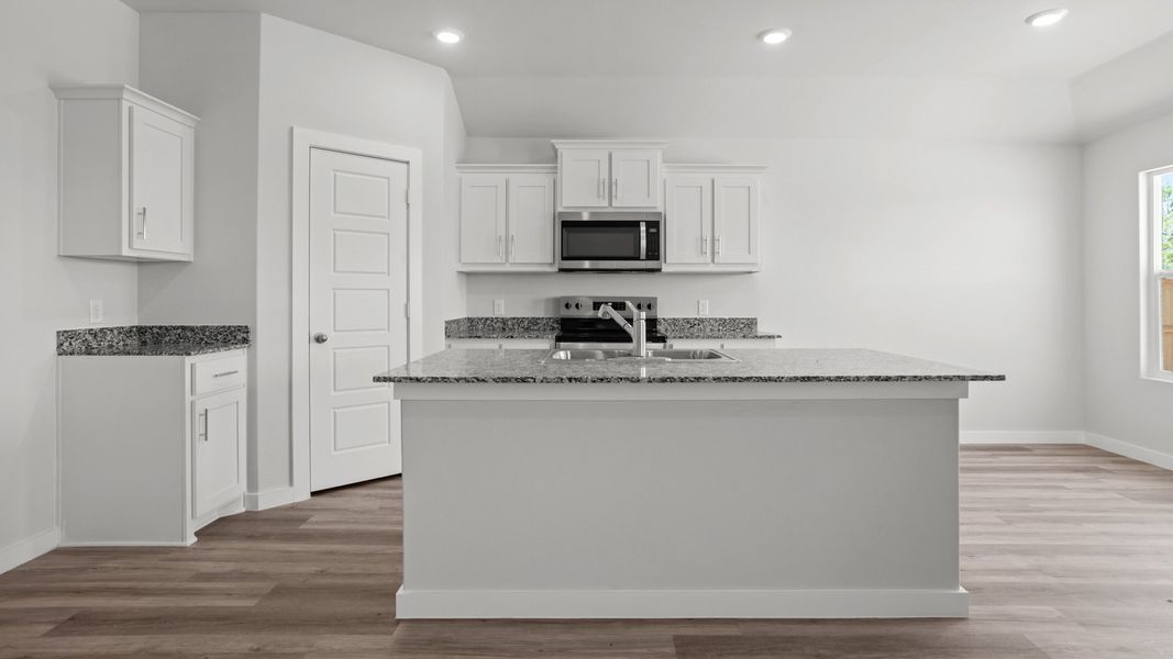 Representative furnished interior of a home built from the ASHBURN by D.R. Horton in Hampton Hills, Abilene (Image 4).