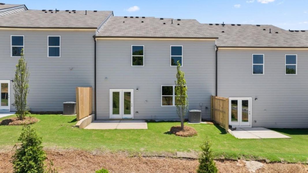 Exterior details and patio area of a home in Village at Pine Valley, Gainesville (Image 3).
