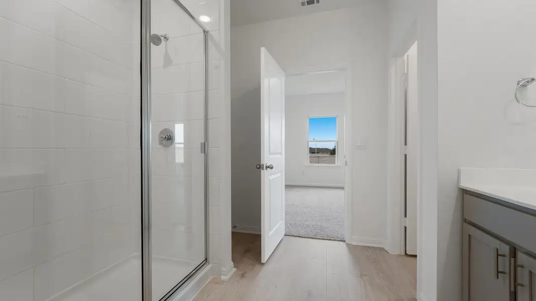 Furnished interior view inside a new home in Prairie Lakes, Buda (Image 9).