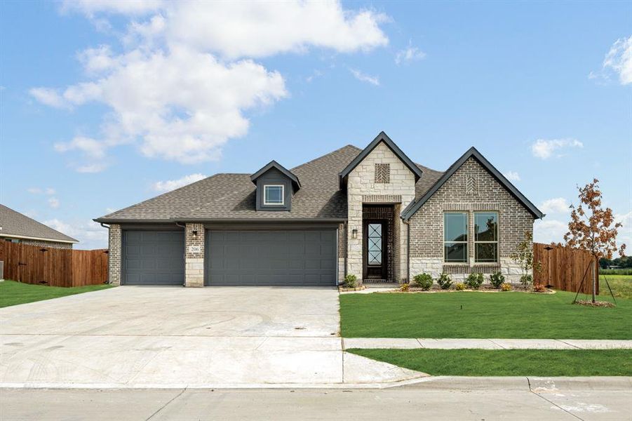 Front exterior of a new home in Waverly Estates, Josephine, TX, highlighting curb appeal (Image 2).