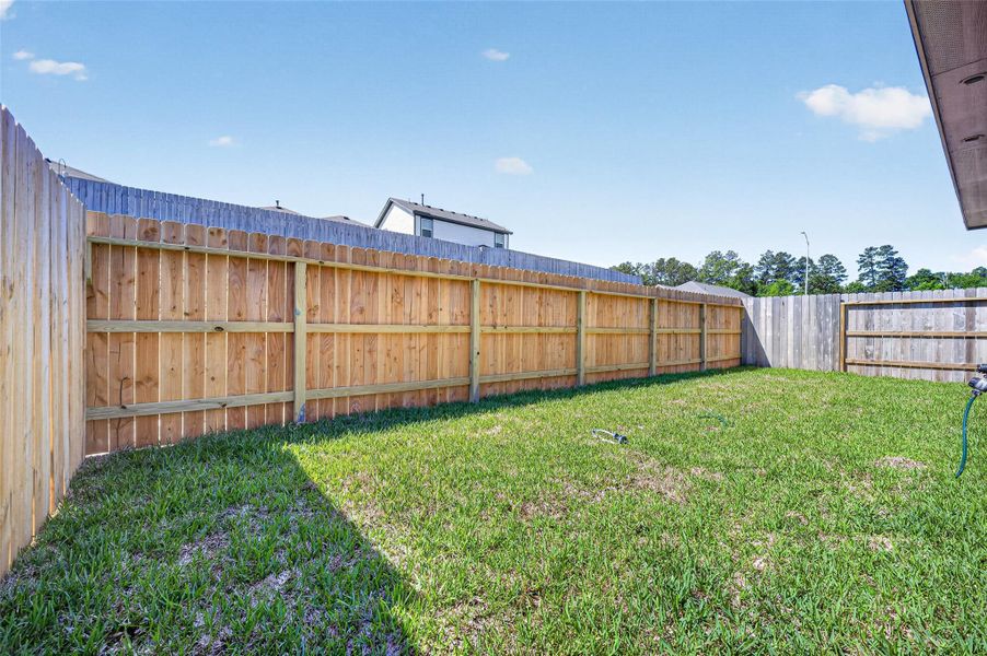 Exterior details and patio area of a home in Mostyn Springs, Magnolia (Image 4).