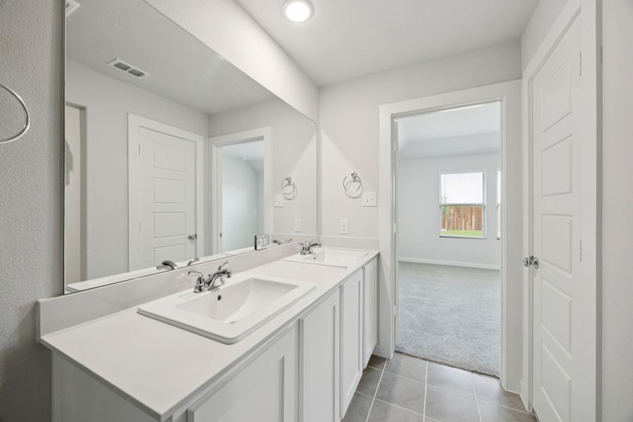 Primary Bathroom in the Hadley home plan by Trophy Signature Homes – REPRESENTATIVE PHOTO Primary Bathroom in the Hadley home plan by Trophy Signature Homes – REPRESENTATIVE PHOTO