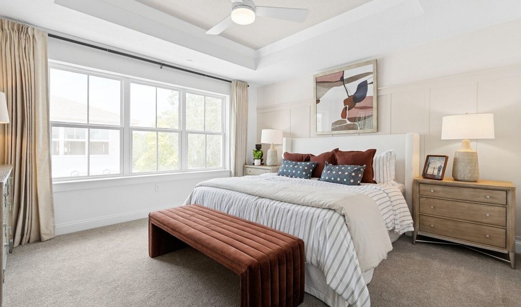 Primary suite with decorative feature wall Primary suite with decorative feature wall