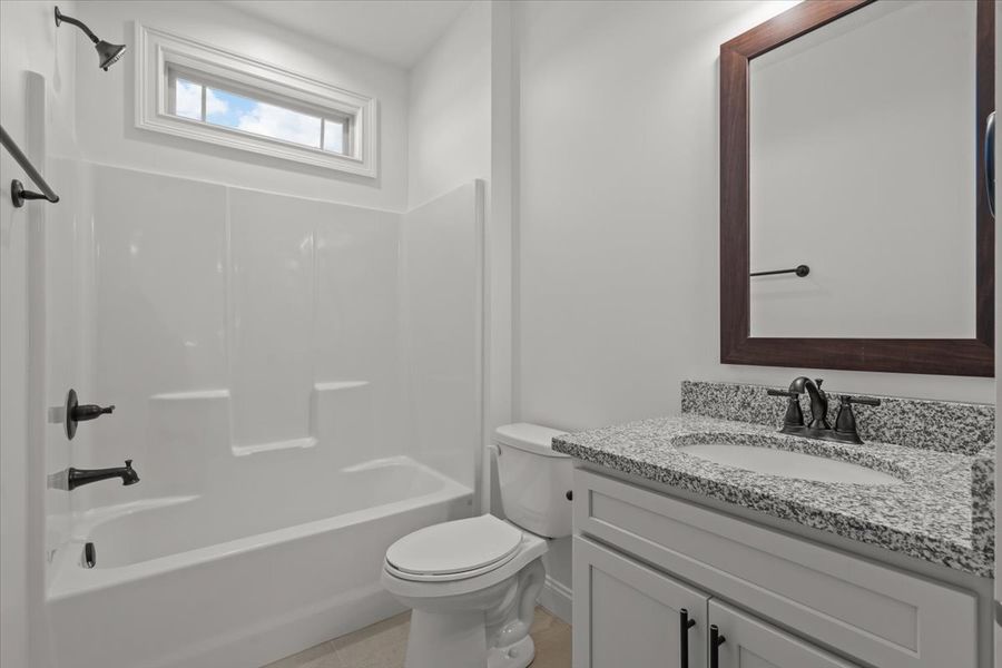 Representative furnished interior of a home built from the Converse by Enchanted Homes in Messer Farms, Inman (Image 10).