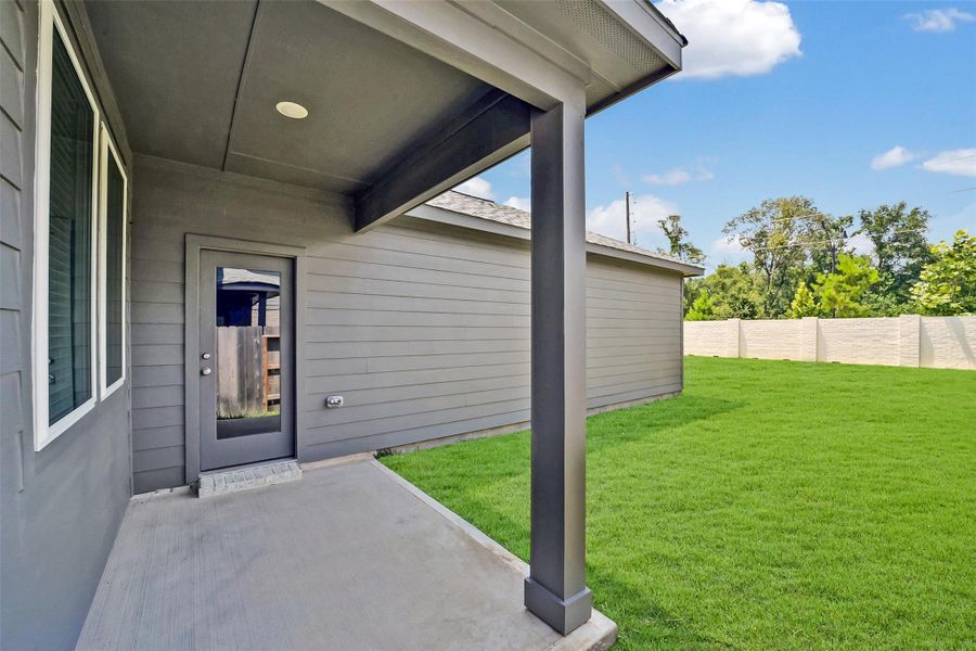 Exterior details and patio area of a home in Saint Tropez, Houston (Image 23). Exterior details and patio area of a home in Saint Tropez, Houston (Image 23).