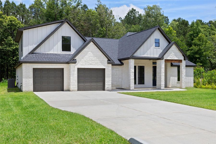 Front exterior of a new home in , Dayton, TX, highlighting curb appeal (Image 25). Front exterior of a new home in , Dayton, TX, highlighting curb appeal (Image 25).