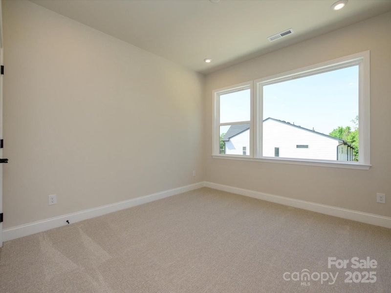 Spacious, unfurnished interior of a new home in Archer Row, Charlotte (Image 3).