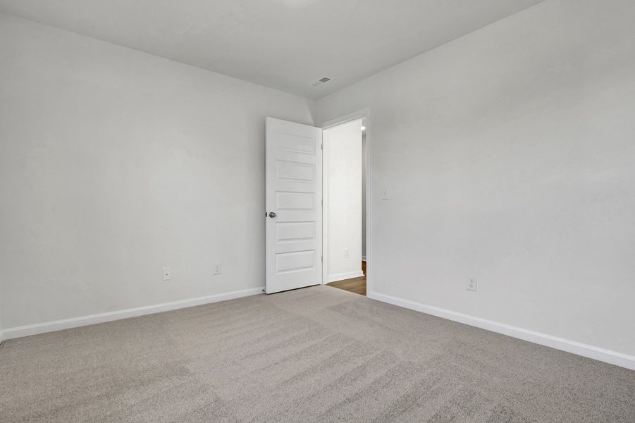 Spacious, unfurnished interior of a new home in Grand Park, Leland (Image 30). Spacious, unfurnished interior of a new home in Grand Park, Leland (Image 30).