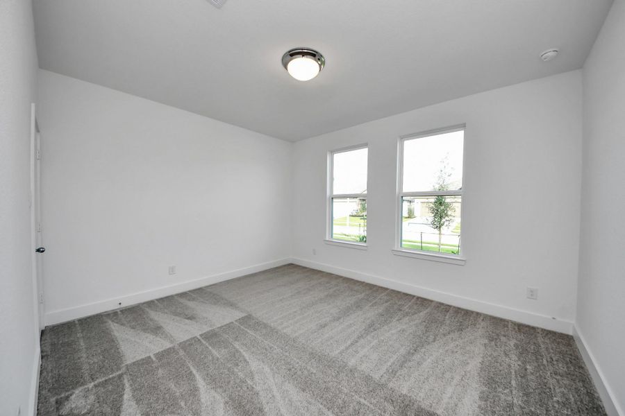 Spacious, unfurnished interior of a new home in The Canopies, Splendora (Image 11).