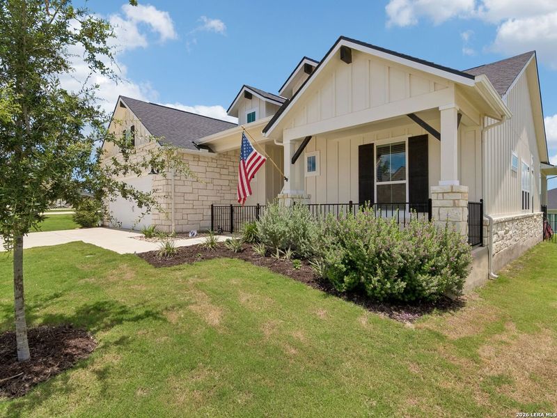 Front exterior of a new home in Kissing Tree, San Marcos, TX, highlighting curb appeal (Image 21). Front exterior of a new home in Kissing Tree, San Marcos, TX, highlighting curb appeal (Image 21).