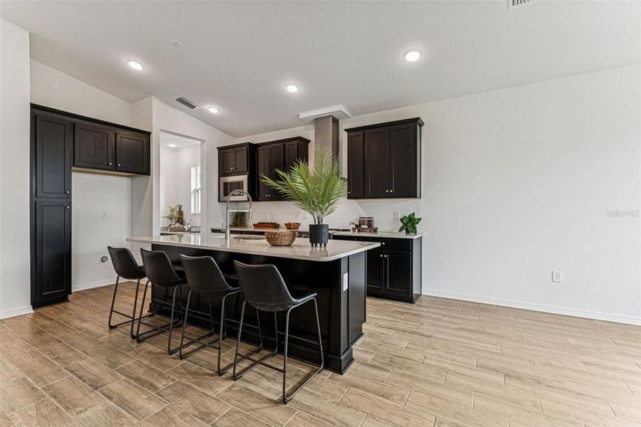Furnished interior view inside a new home in Isles at Bayview, Parrish (Image 9). Furnished interior view inside a new home in Isles at Bayview, Parrish (Image 9).