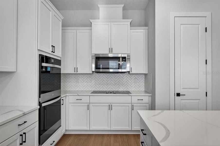 Furnished interior view inside a new home in Stables at Cary Forest, Bryceville (Image 11).