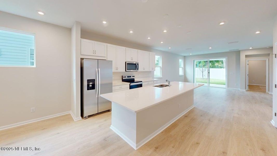 Furnished interior view inside a new home in Sandridge Hills, Green Cove Springs (Image 3).