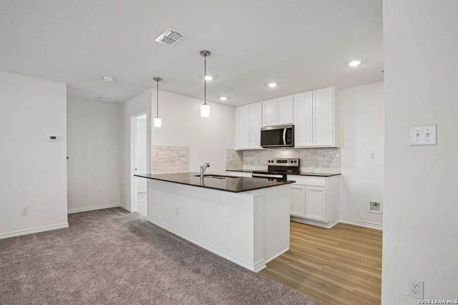 Furnished interior view inside a new home in Southton Cove, Elmendorf (Image 9).