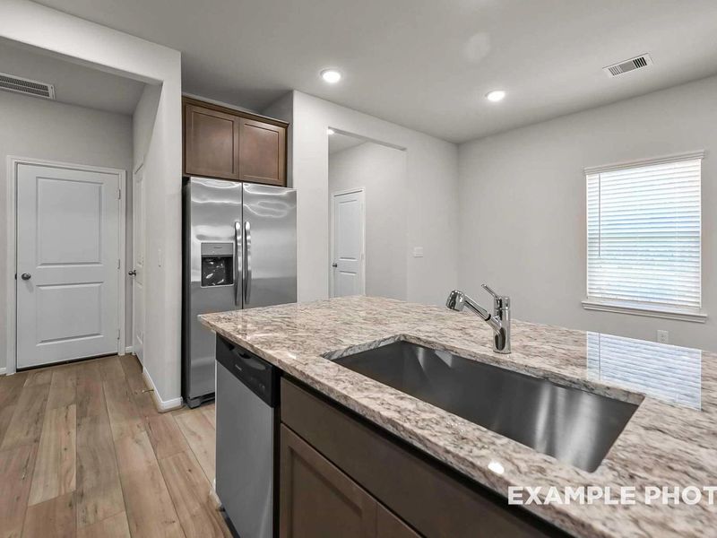 Furnished interior view inside a new home in Caney Creek Place, Conroe (Image 9).