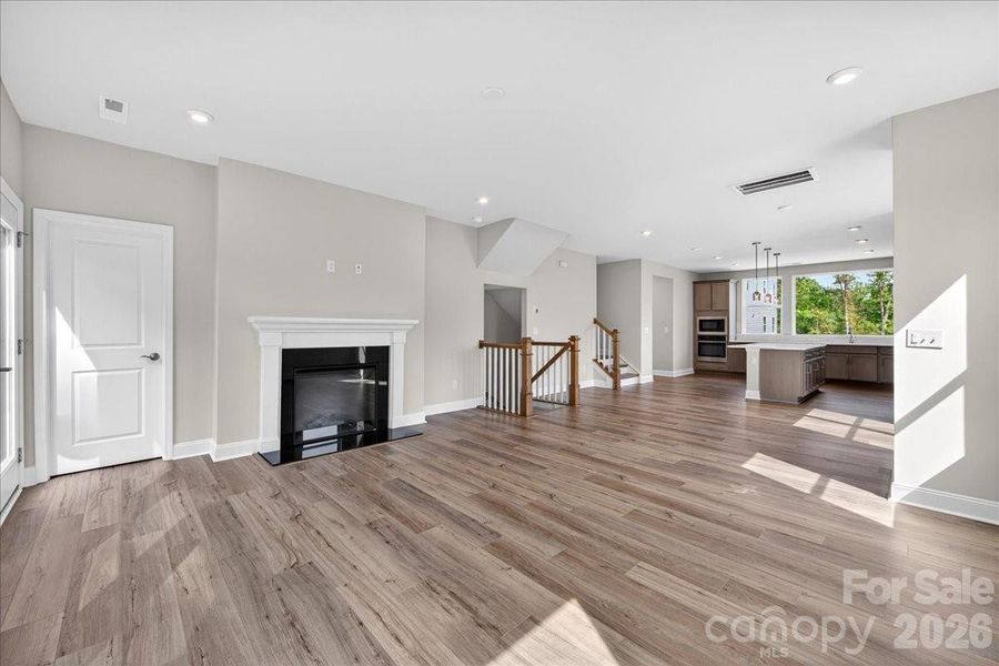 Living room featuring an electric fireplace