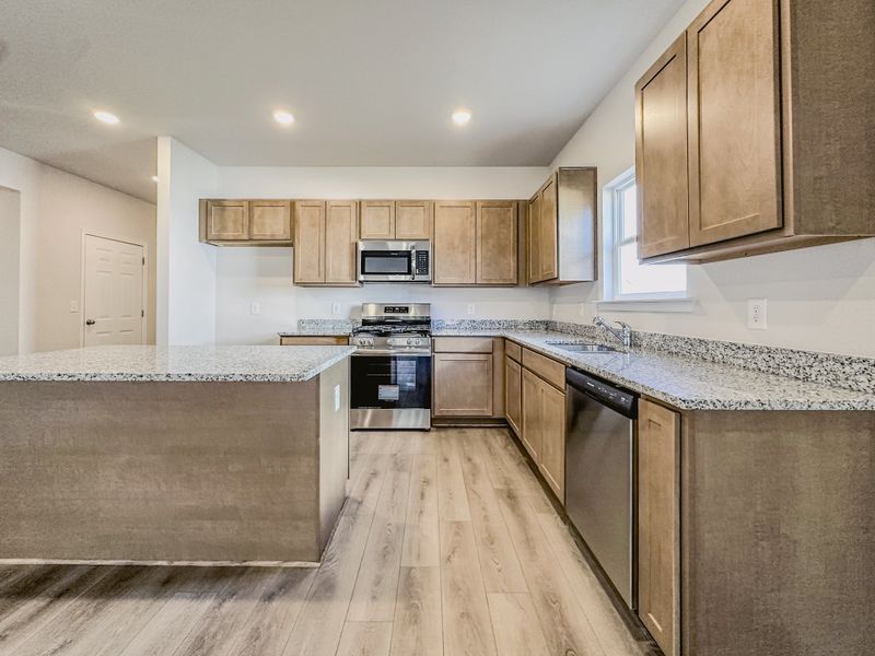 Representative furnished interior of a home built from the The Hampton by Smith Douglas Homes in Enclave at Willis, Willis (Image 8).