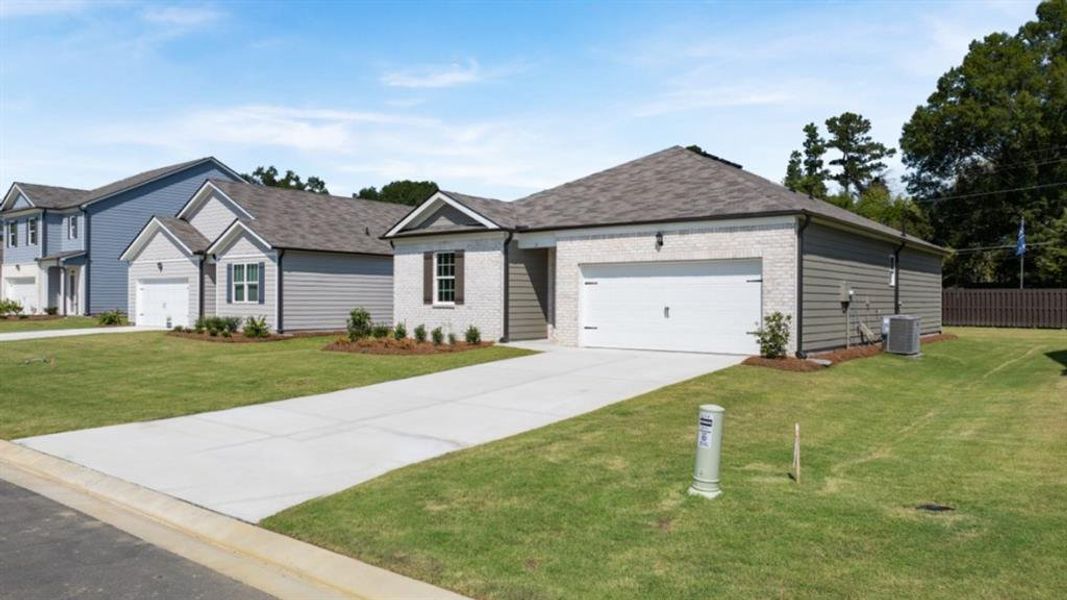 Front exterior of a new home in Northberry, Rome, GA, highlighting curb appeal (Image 1). Front exterior of a new home in Northberry, Rome, GA, highlighting curb appeal (Image 1).