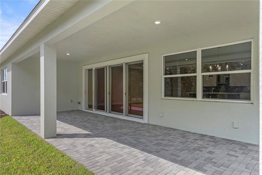 Exterior details and patio area of a home in Cresswind at Hammock Oaks, Lady Lake (Image 2).