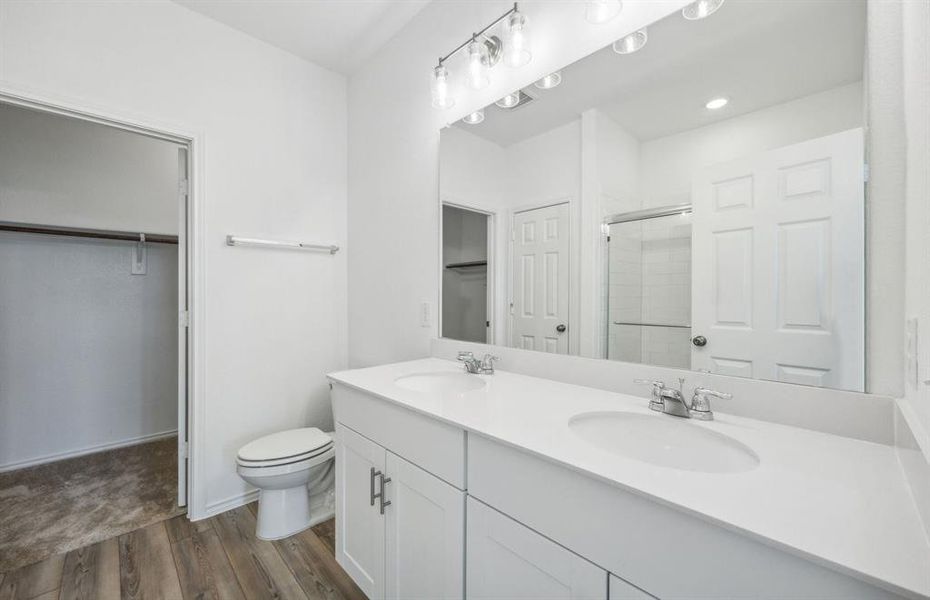 Owner's bath with dual vanity *real home pictured