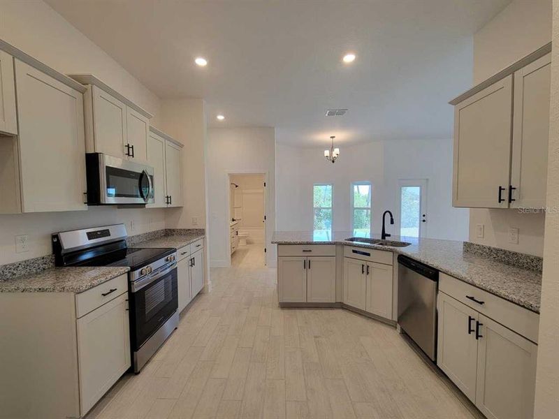 Furnished interior view inside a new home in , Ocala (Image 5).