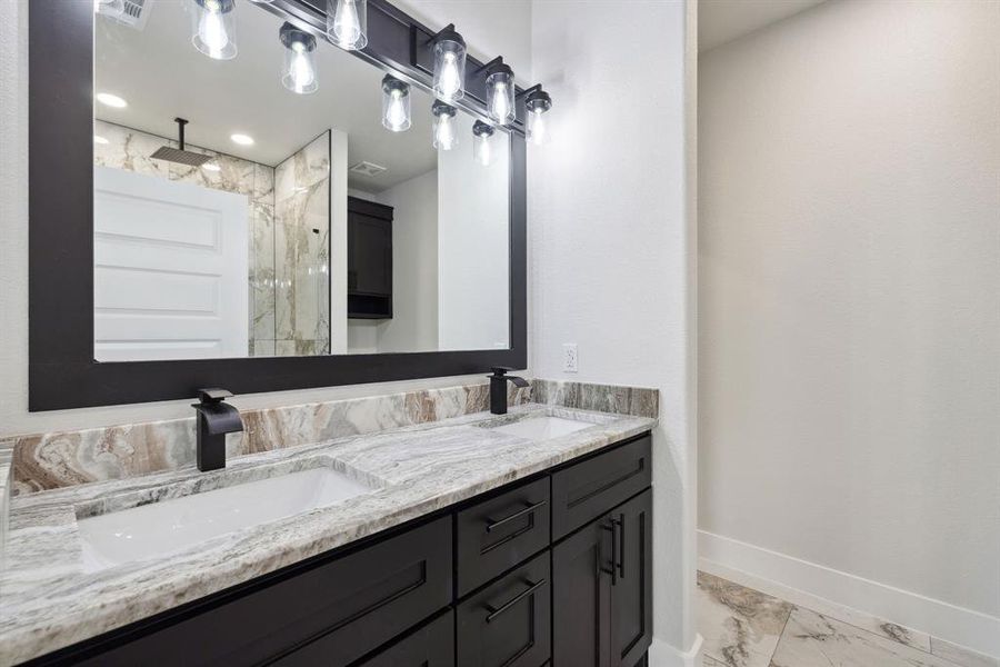 Bathroom with vanity and walk in shower