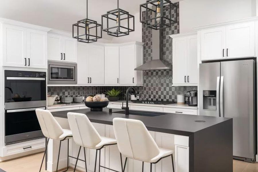 Photo of Pulte model home with same floor plan, not of actual home listed. Photo of Pulte model home with same floor plan, not of actual home listed.