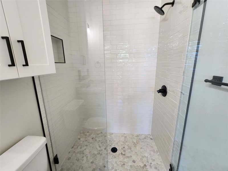 Bathroom with a shower stall