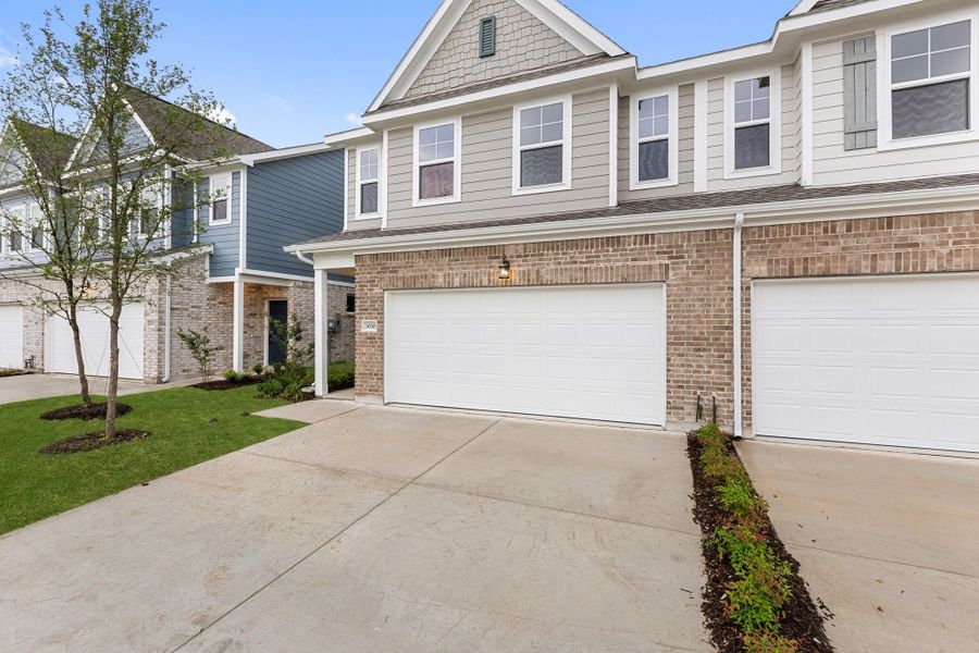 Front exterior of a new home in Lake Park Villas, Wylie, TX, highlighting curb appeal (Image 26).