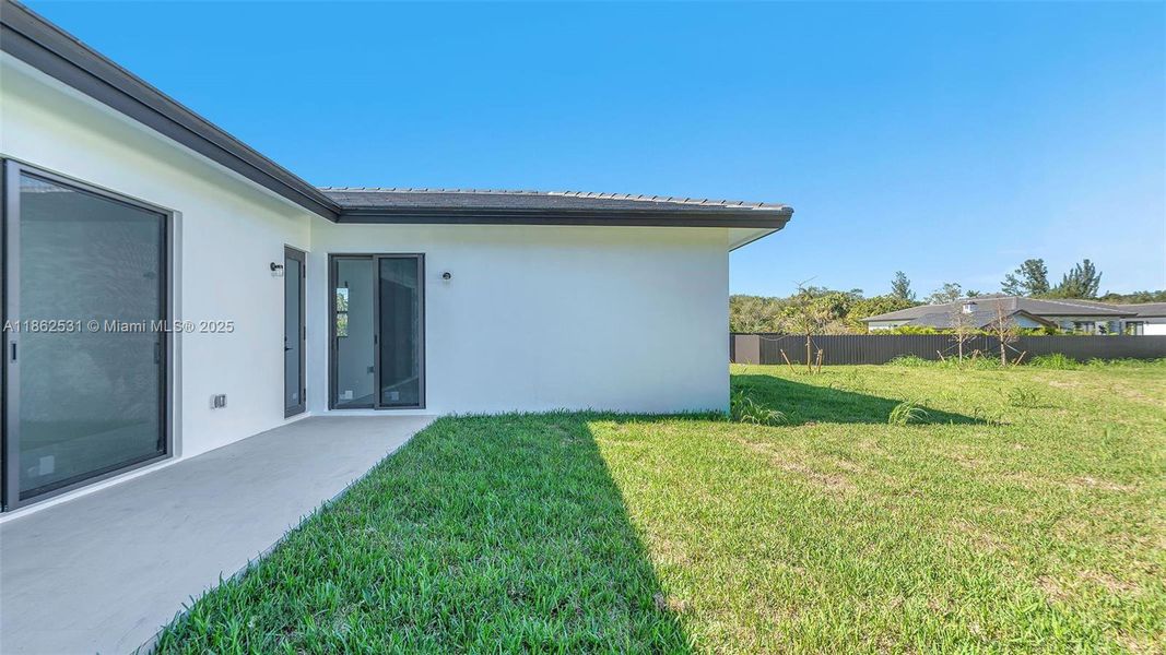 Front exterior of a new home in , Miami, FL, highlighting curb appeal (Image 22).