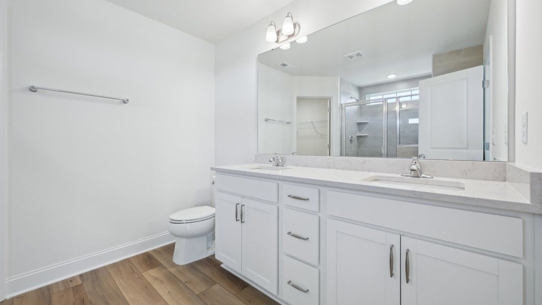 Representative furnished interior of a home built from the Bordeaux by DRB Homes in Station Pointe, Angier (Image 17). Representative furnished interior of a home built from the Bordeaux by DRB Homes in Station Pointe, Angier (Image 17).