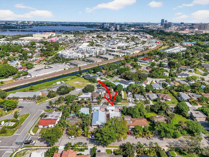 Front exterior of a new home in , West Palm Beach, FL, highlighting curb appeal (Image 14). Front exterior of a new home in , West Palm Beach, FL, highlighting curb appeal (Image 14).