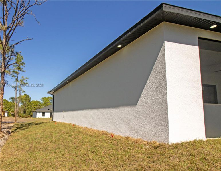 Exterior details and patio area of a home in , Lehigh Acres (Image 28).