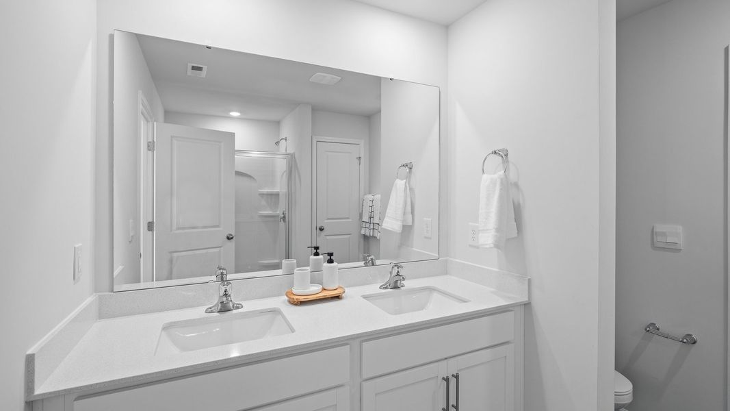 Furnished interior view inside a new home in The Townes at Ridgewood Farms, Winterville (Image 15).