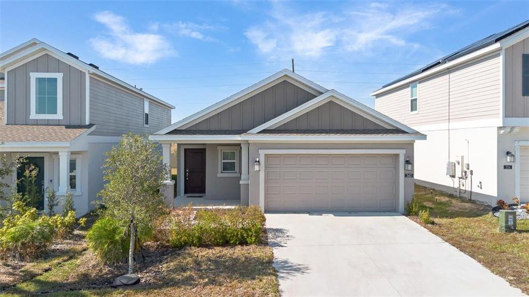 Front exterior of a new home in , Davenport, FL, highlighting curb appeal (Image 22). Front exterior of a new home in , Davenport, FL, highlighting curb appeal (Image 22).