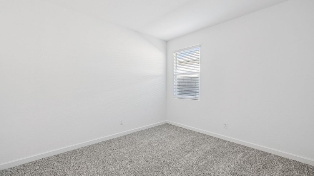 Spacious, unfurnished interior of a new home in Desert Moon Estates, Buckeye (Image 28).