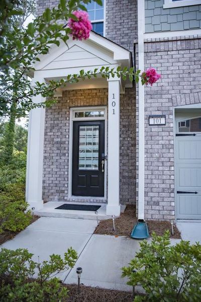 Front exterior of a new home in , Woodstock, GA, highlighting curb appeal (Image 11).
