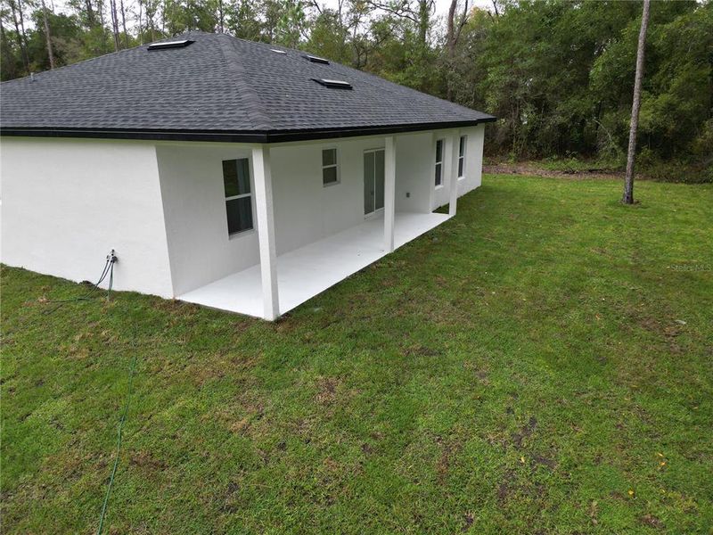 Exterior details and patio area of a home in , Citrus Springs (Image 4).