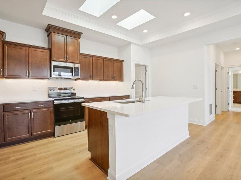 Furnished interior view inside a new home in , Holly Springs (Image 10).