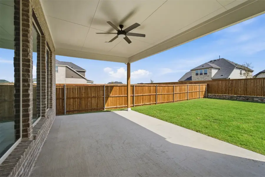 Exterior details and patio area of a home in Green Meadows, Celina (Image 4).