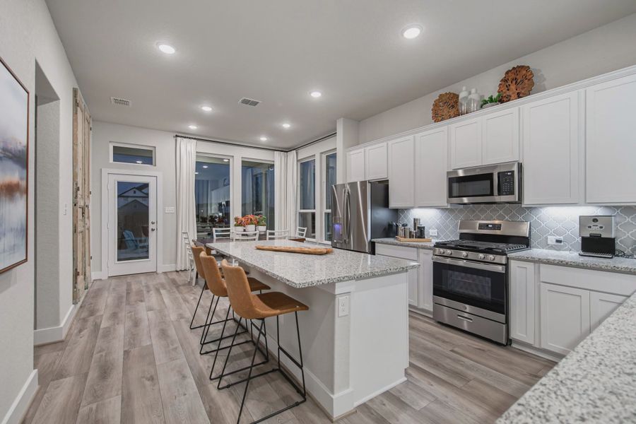 Representative furnished interior of a home built from the Powell by Chesmar Homes in Buffalo Crossing, Cibolo (Image 7).