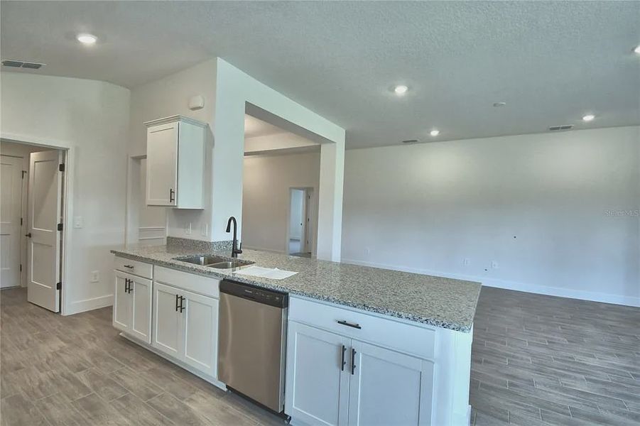 Furnished interior view inside a new home in Lake Juliana Estates, Auburndale (Image 7).