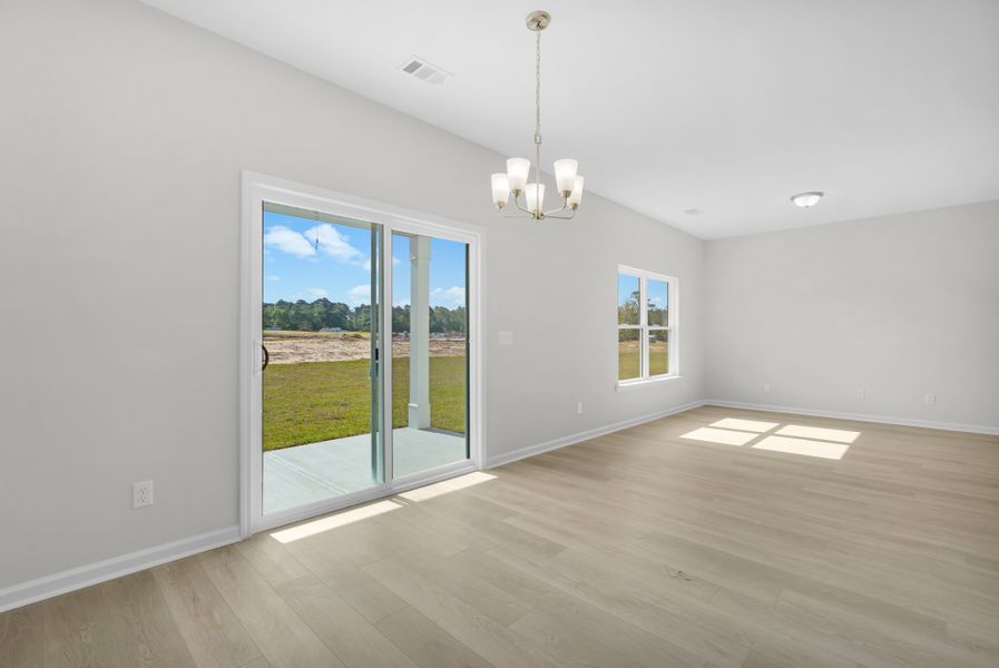 Representative unfurnished interior of a home built from the The Magnolia by Smith Family Homes in Lakeview Pines, Statesboro (Image 41).