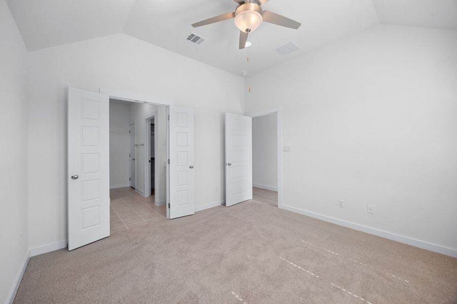 Primary Suite in the Cypress home plan by Trophy Signature Homes - REPRESENTATIVE PHOTO