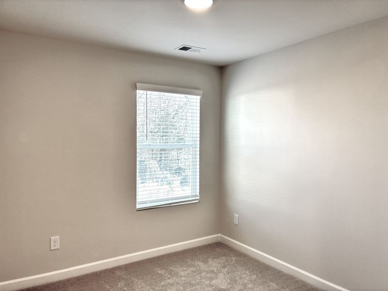 Spacious, unfurnished interior of a new home in Holly View, Greenville (Image 17).