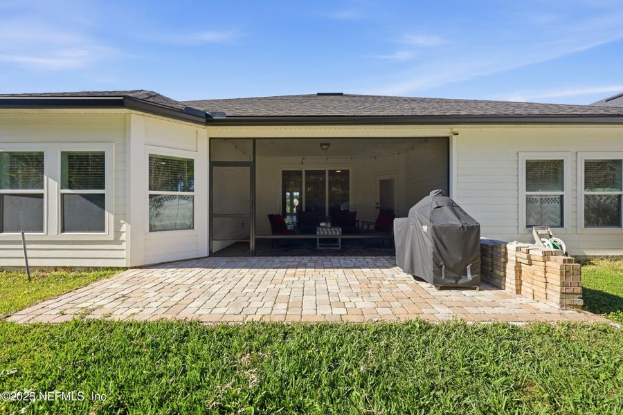 Exterior details and patio area of a home in Silver Landing at SilverLeaf, St. Augustine (Image 25).