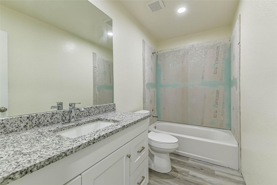 Furnished interior view inside a new home in , Conroe (Image 8).